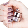 Nails featuring a smoky purple holographic powder with intense sparkle and multidimensional shine.

