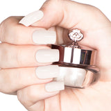 Nails featuring a soft, creamy white matte powder with a smooth, non-reflective finish.
